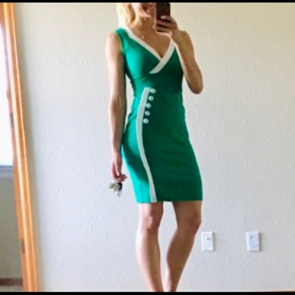 Green sheath style dress with button details
